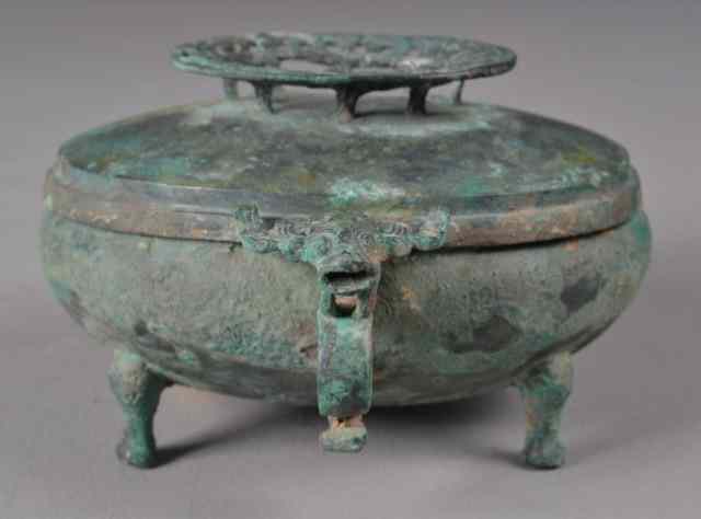 Appraisal: Chinese Bronze Zhou Food VesselOf circular form with detachable cover