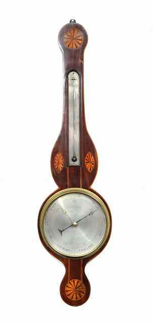 Appraisal: AN EARLY TH CENTURY WHEEL BAROMETER The silvered dial signed