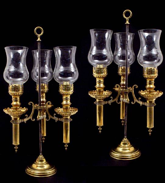 Appraisal: A pair of Continental brass and engraved glass three light