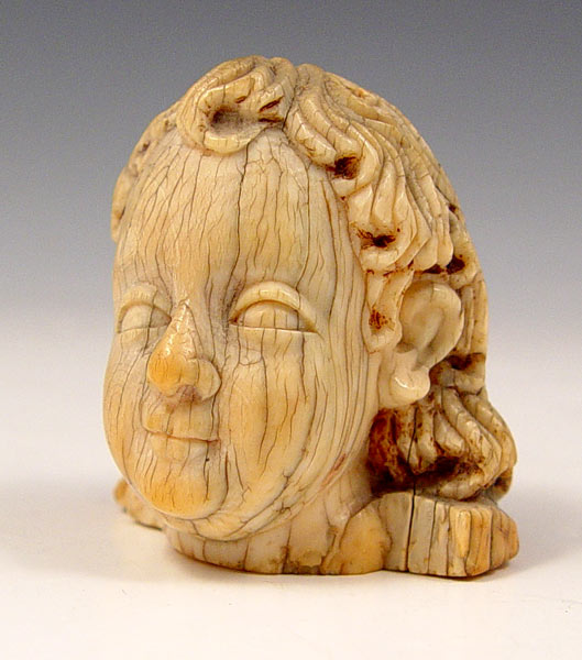 Appraisal: th - th C CARVED IVORY HEAD Probably the Christ