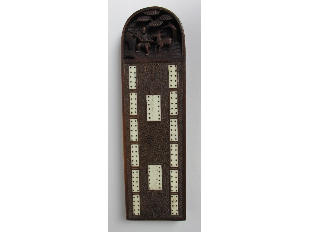 Appraisal: A Chinese carved wood and bone cribbage board cm long