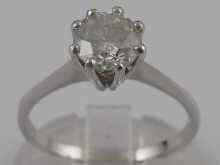 Appraisal: A white metal tests carat gold diamond solitaire ring the