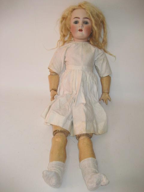 Appraisal: An Alt Beck Gottschalck bisque head girl doll with blue