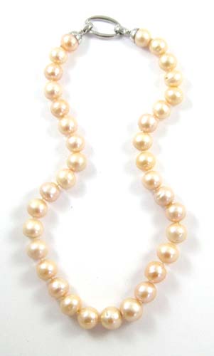 Appraisal: PRINCESS LENGTH PINK PEARL NECKLACE strung with well matched off