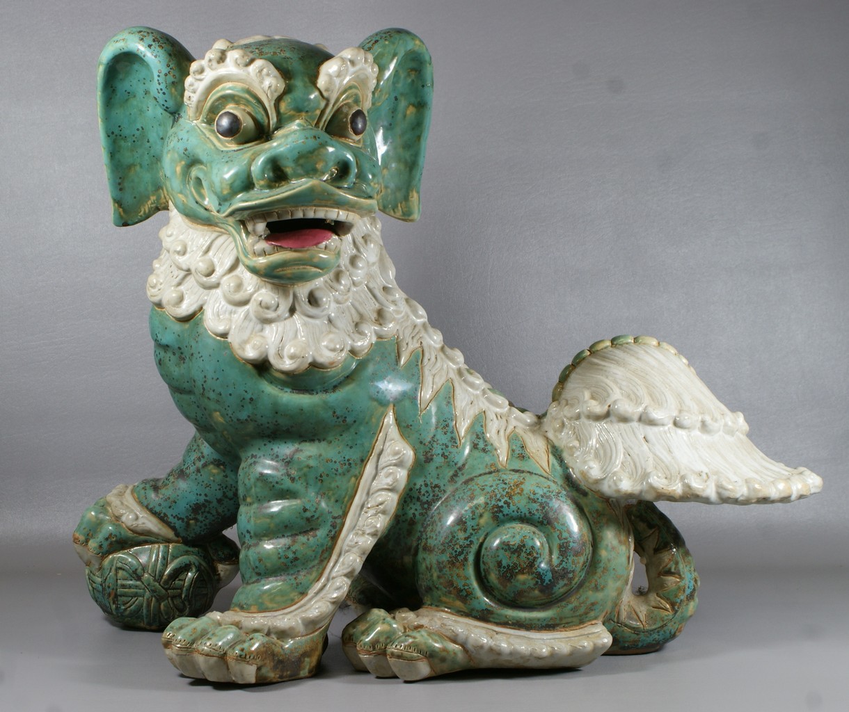 Appraisal: Chinese pottery foo dog Turquoise and ivory colored h l