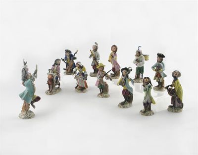 Appraisal: A Continental porcelain monkey band eleven hirsute musicians playing various