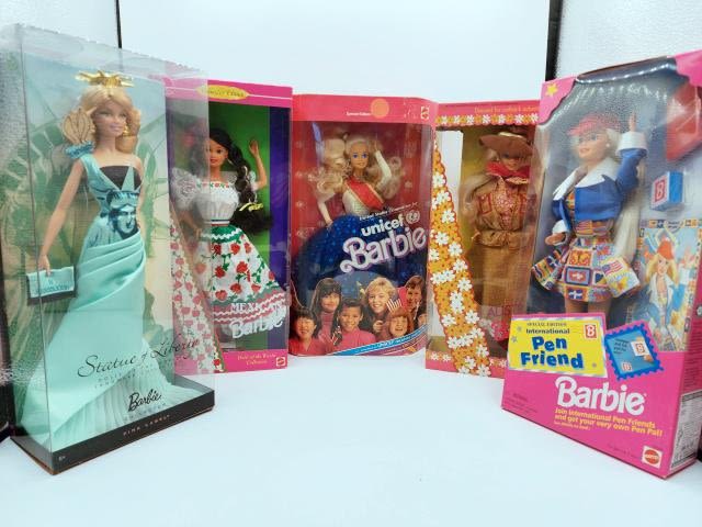 Appraisal: Dolls of the World UNICEF Barbies All dolls are new