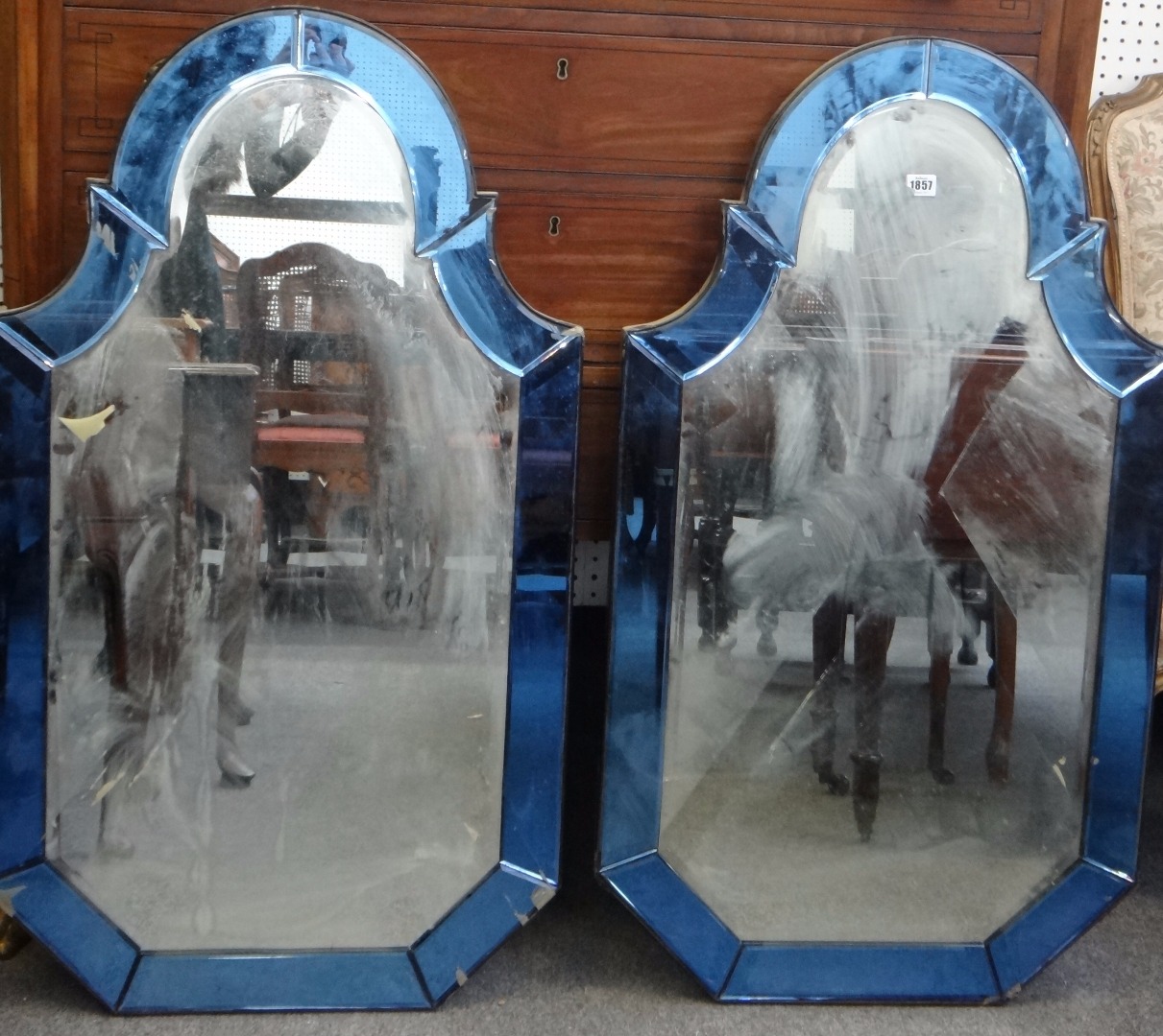 Appraisal: A pair of th century blue glass framed arch top