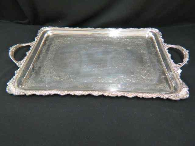 Appraisal: Fine Silverplate Serving Tray rococo shell border fancy engraving handled