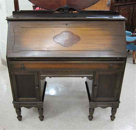 Appraisal: SLANT-FRONT DOUBLE PEDESTAL MAHOGANY SECRETARY Northwestern Cabinet Co Burlington Iowa