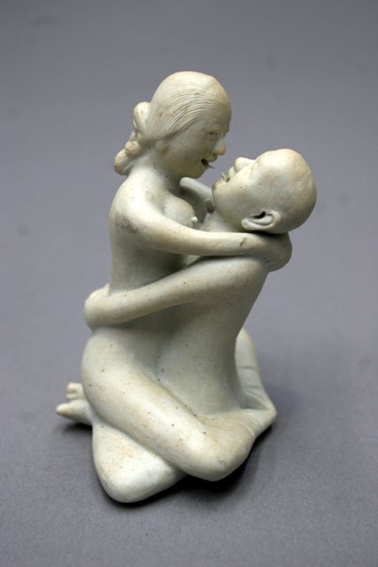 Appraisal: A Chinese porcelain erotic figure group