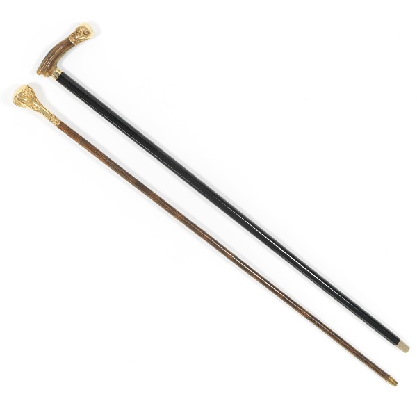 Appraisal: TWO VICTORIAN WOOD AND GOLD PLATED WALKING STICKS One with