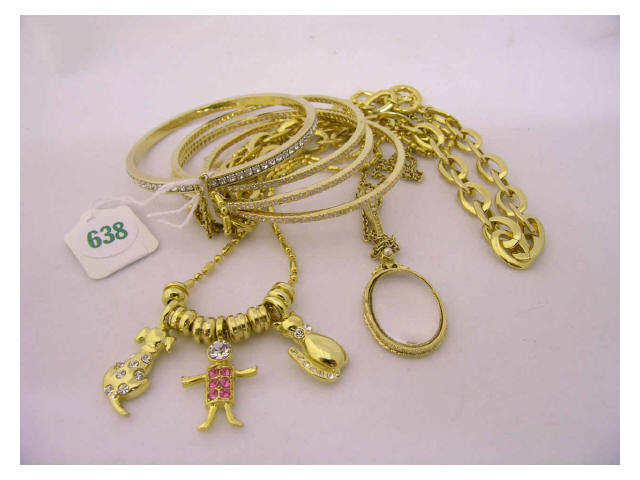 Appraisal: Five gold tone bracelets and three necklaces including Nolan Miller