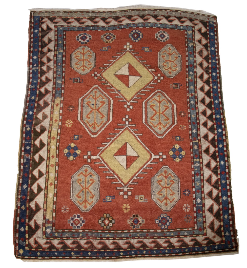 Appraisal: BORDJALOU KAZAK RUG Two radiating diamond medallions flanked by six