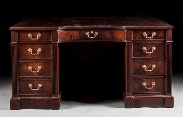 Appraisal: Georgian style mahogany kneehole desk tooled leather top in H