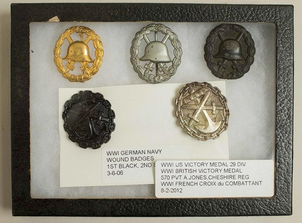 Appraisal: German WWI Wound Badges both Army and Navy A World