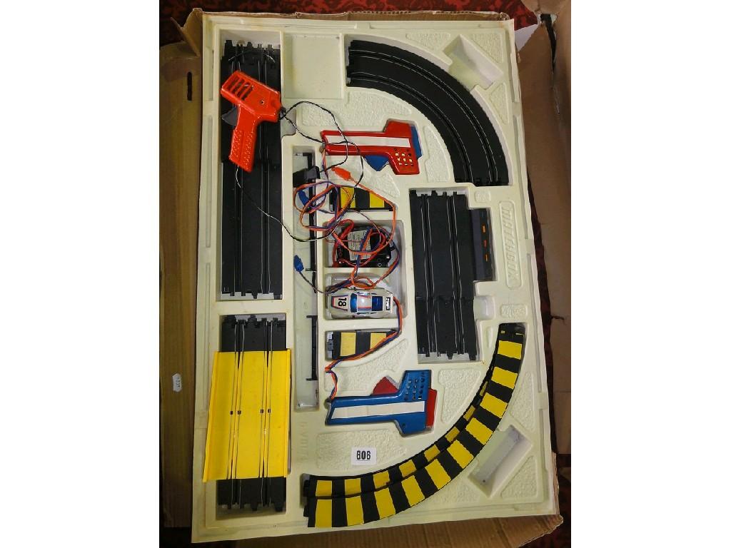 Appraisal: A Matchbox power track with working lights race and chases