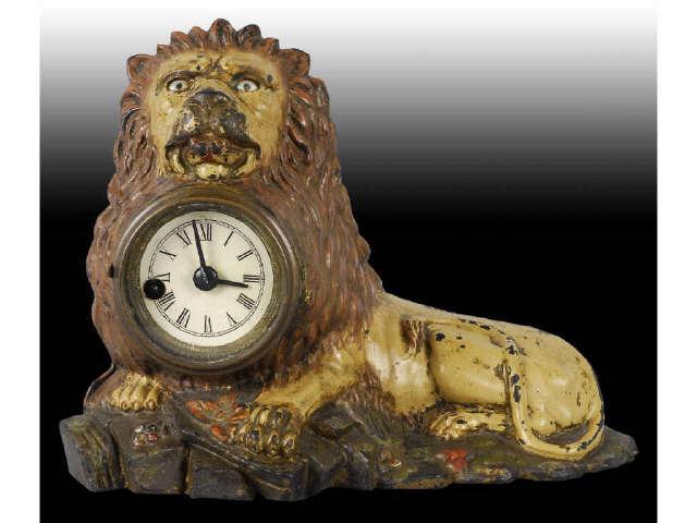 Appraisal: Lion Blinking Eye Cast Iron Clock Description Marked Bradley and