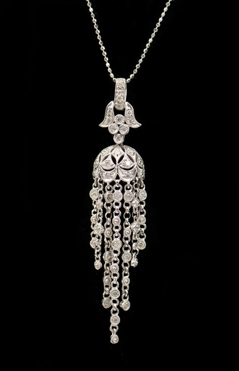 Appraisal: K DIAMOND TASSEL NECKLACE K white gold diamond necklace contains