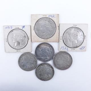 Appraisal: Collection of Seven U S Silver Dollars Includes four Peace