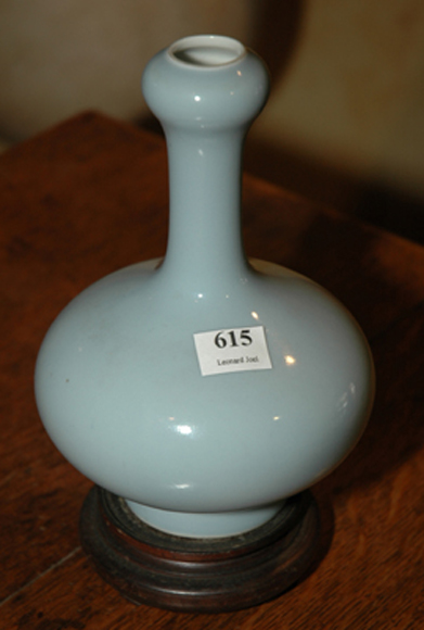 Appraisal: A CHINESE BLUE GLAZED PORCELAIN BOTTLE VASE Globular with a