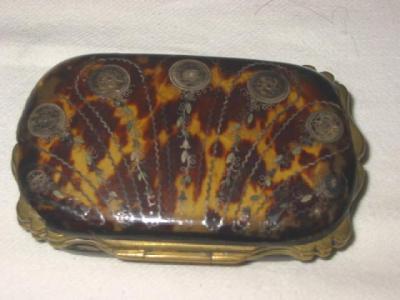 Appraisal: A TORTOISESHELL PURSE similar to the previous lot inlaid with