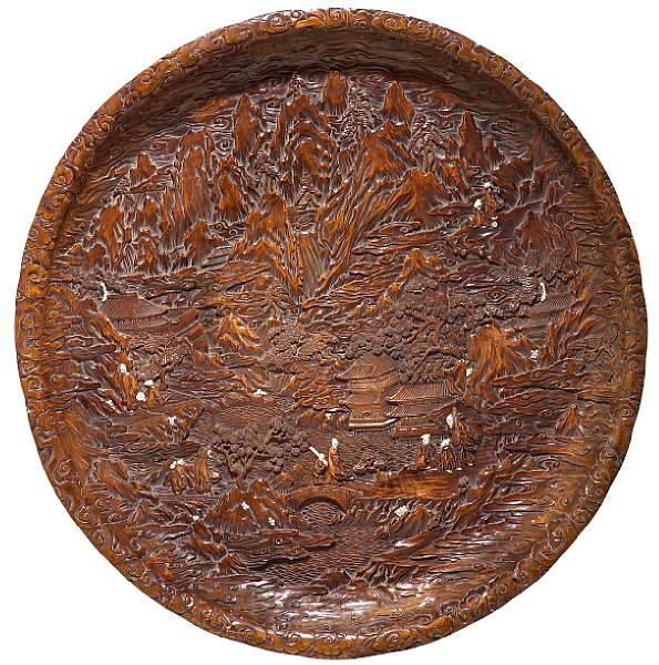 Appraisal: A massive carved wood charger with ivory inlay th Century