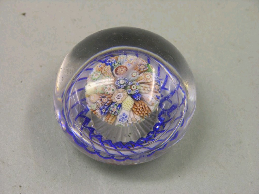 Appraisal: A th century French glass paperweight millefiore-type against a twist