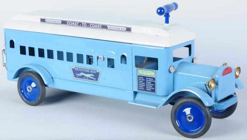 Appraisal: Pressed Steel Keystone Coast-to-Coast Bus American Scarce ride-on toy with