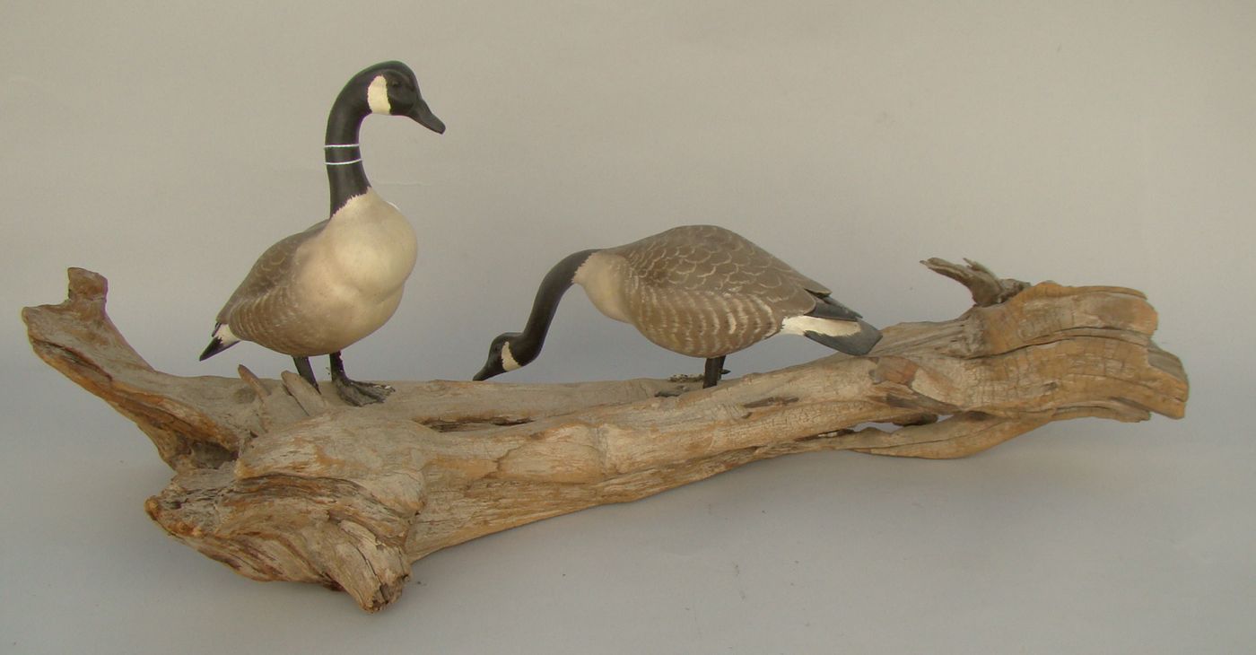 Appraisal: MINIATURE PAIR OF CANADA GEESE By Mark Holland of Brewster