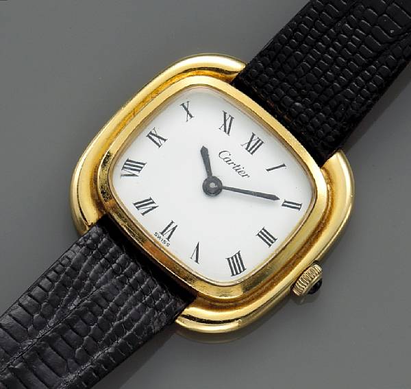 Appraisal: An eighteen karat gold wristwatch with black leather strap Cartier