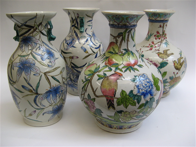 Appraisal: FOUR HAND ENAMELED CHINESE POTTERY VASES pair having colorful bird