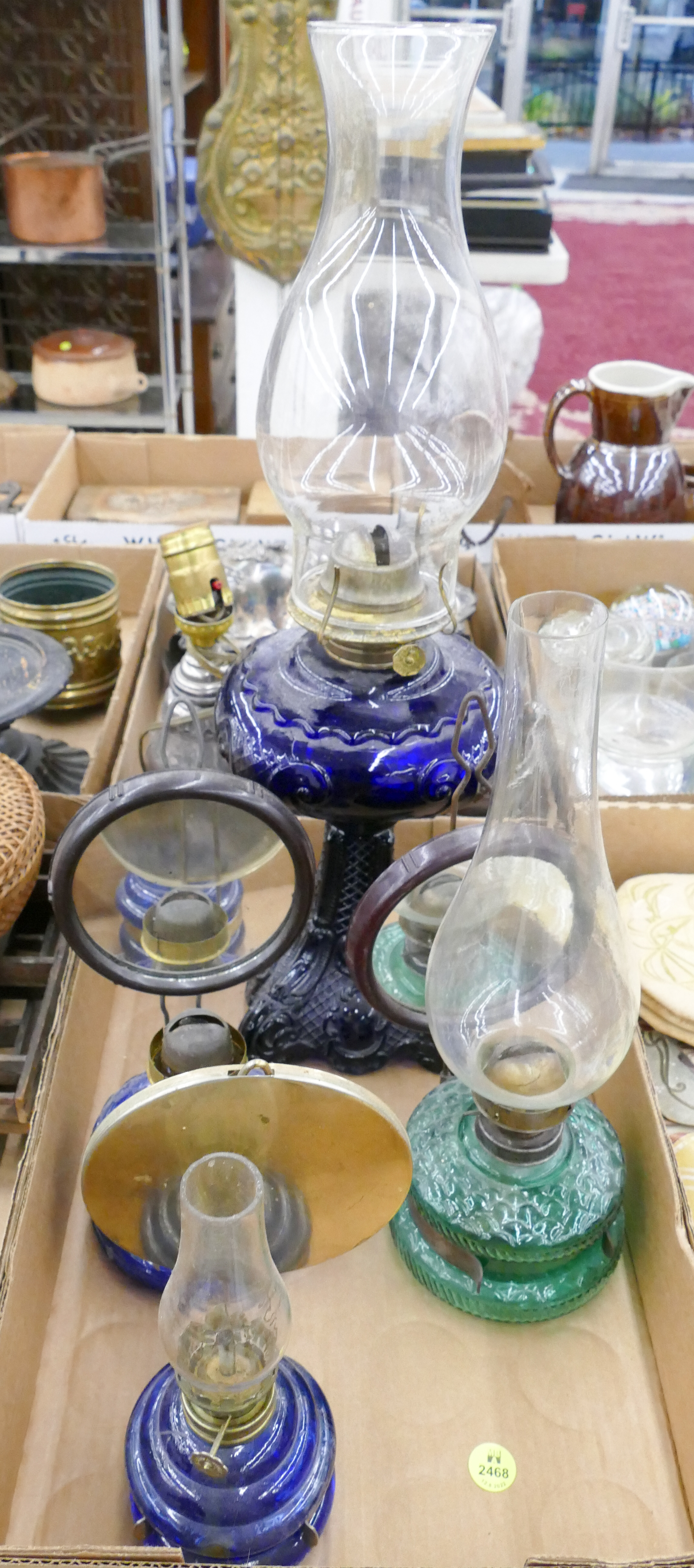 Appraisal: Box Colored Glass Oil Lamps