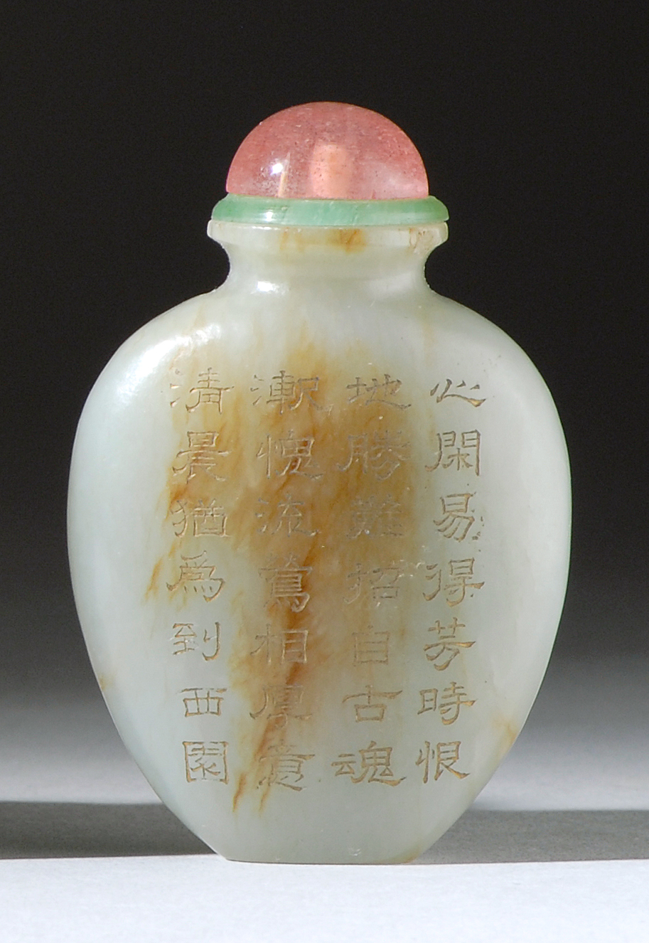 Appraisal: RUSSET AND GRAY JADE SNUFF BOTTLE Mid- th CenturyIn spade