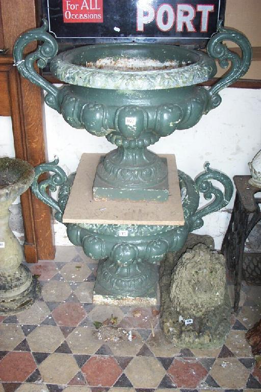 Appraisal: A pair of good quality heavy cast iron campana shaped