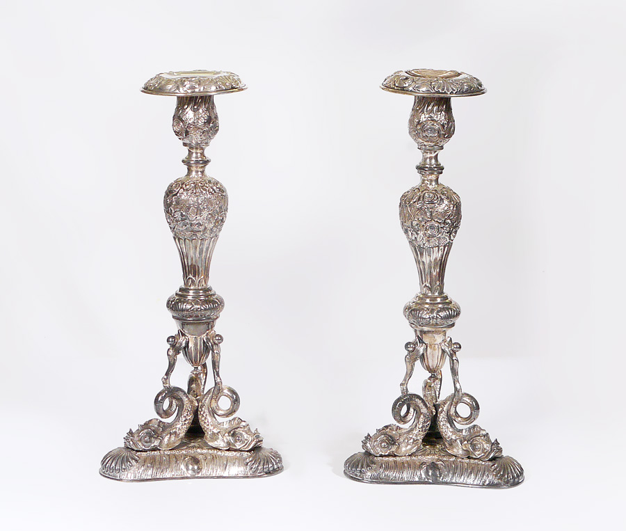 Appraisal: PAIR FIGURAL DOLPHIN SILVERPLATE CANDELABRA Single light candlesticks base with