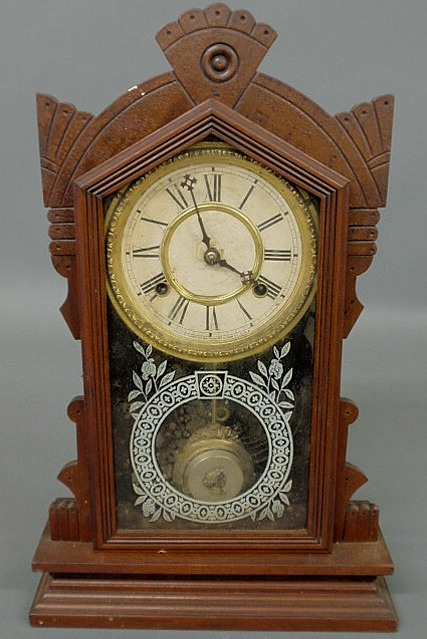 Appraisal: Carved walnut shelf clock by Waterbury Clock Co h x