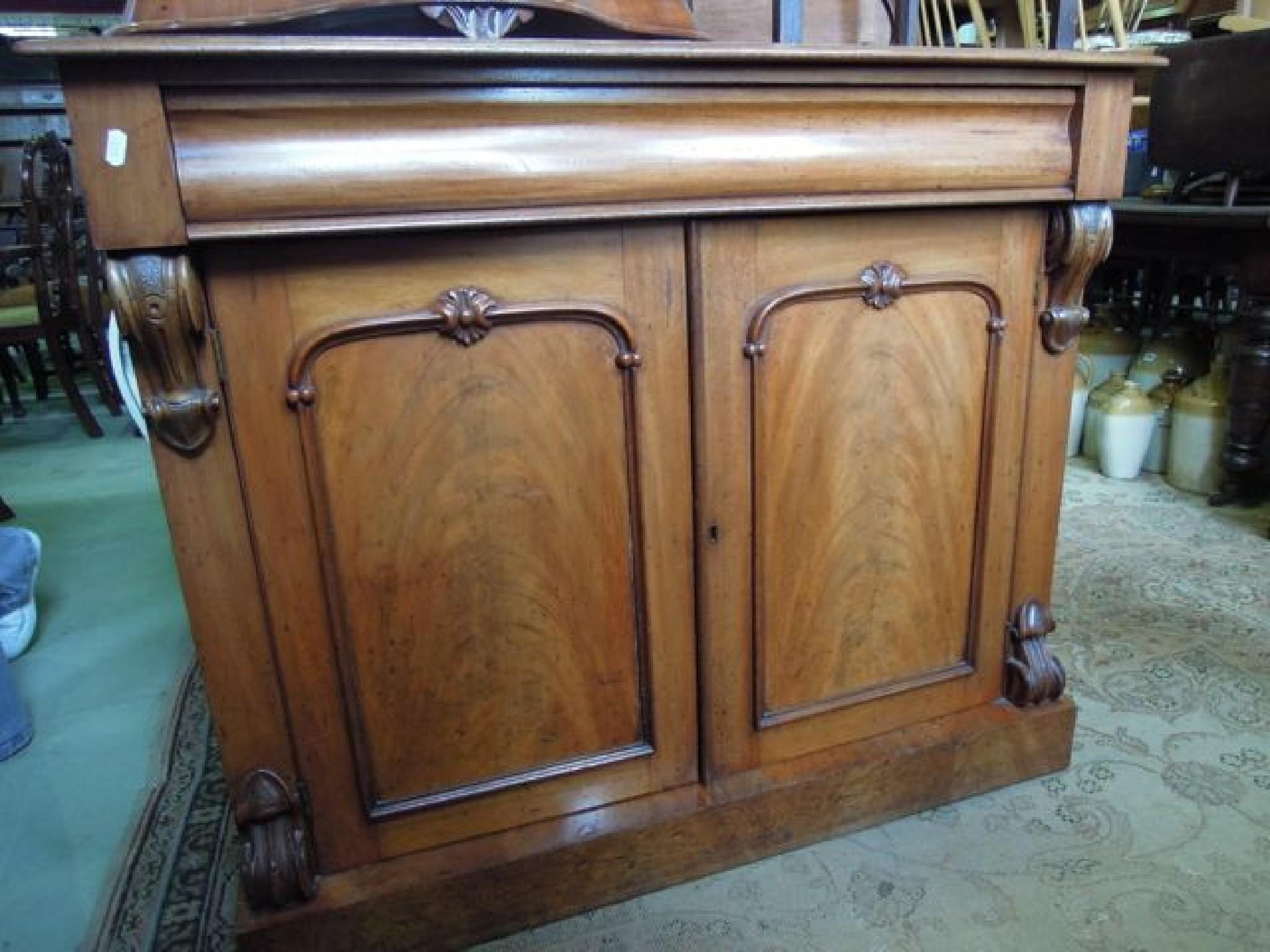 Appraisal: A Victorian mahogany chiffonier the shallow raised back with 'c'