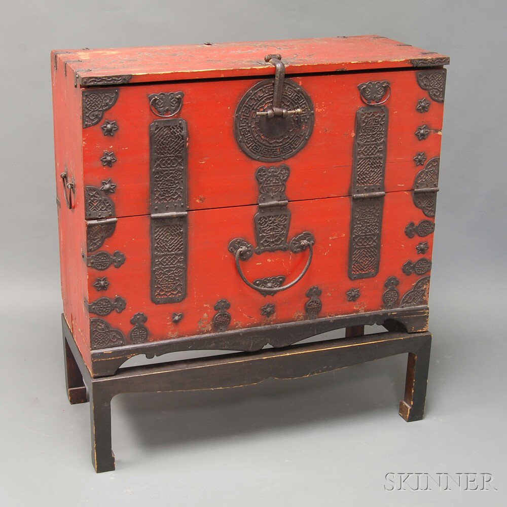 Appraisal: Chinese Red-painted Iron-bound Chest on Stand with a fall-front lid