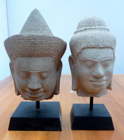 Appraisal: Two Cambodian carved stone heads