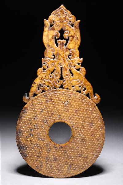 Appraisal: Chinese archaistic hardstone bi with elaborate openwork detail overall good