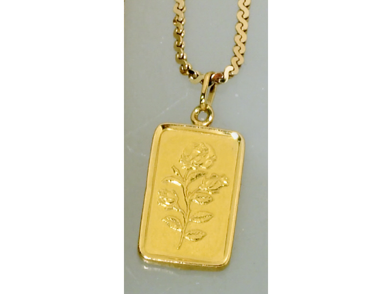 Appraisal: GRAM SUISSE INGOT In k yellow gold pendant frame with