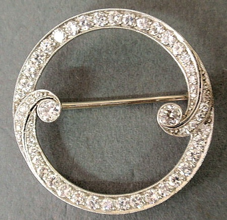 Appraisal: Diamond and platinum circle brooch with round brilliant single cut