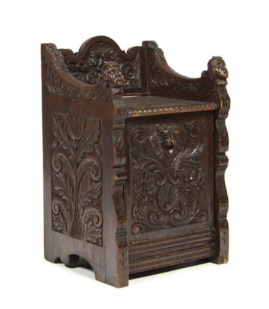 Appraisal: Carved Renaissance Revival Coal Scuttle of rectangular form having carved