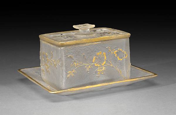 Appraisal: A Daum Nancy gilt decorated cameo glass covered box on