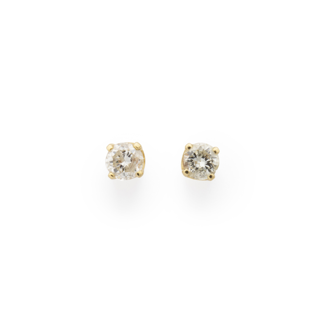 Appraisal: A PAIR OF DIAMOND AND FOURTEEN KARAT GOLD STUD EARRINGS