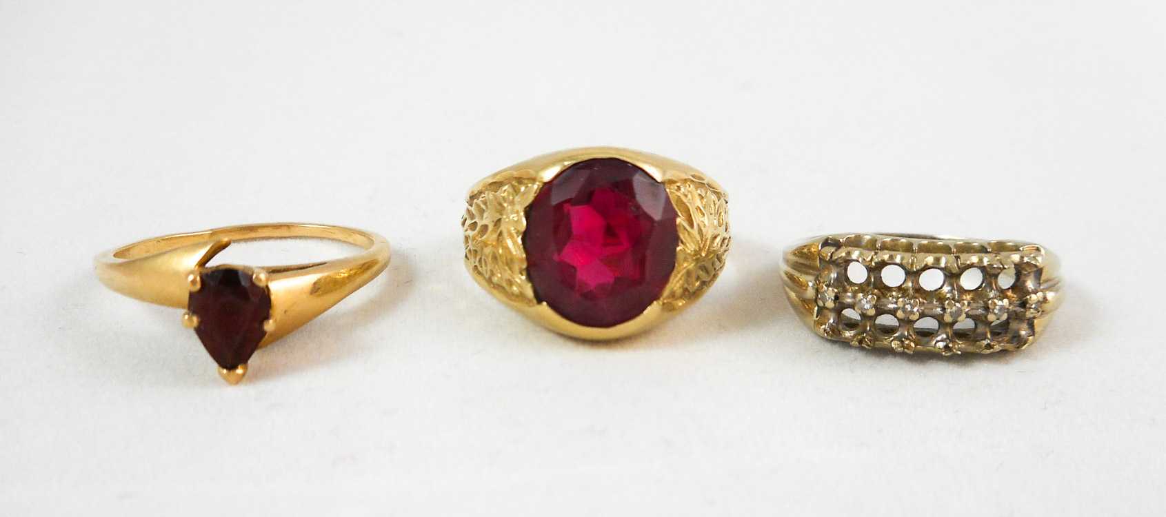 Appraisal: THREE FOURTEEN KARAT GOLD RINGS including a size - yellow