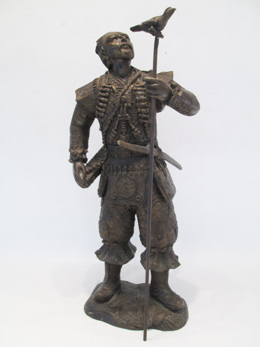 Appraisal: CHINESE BRONZE FIGURAL SCULPTURE depicting a standing warrior in traditional