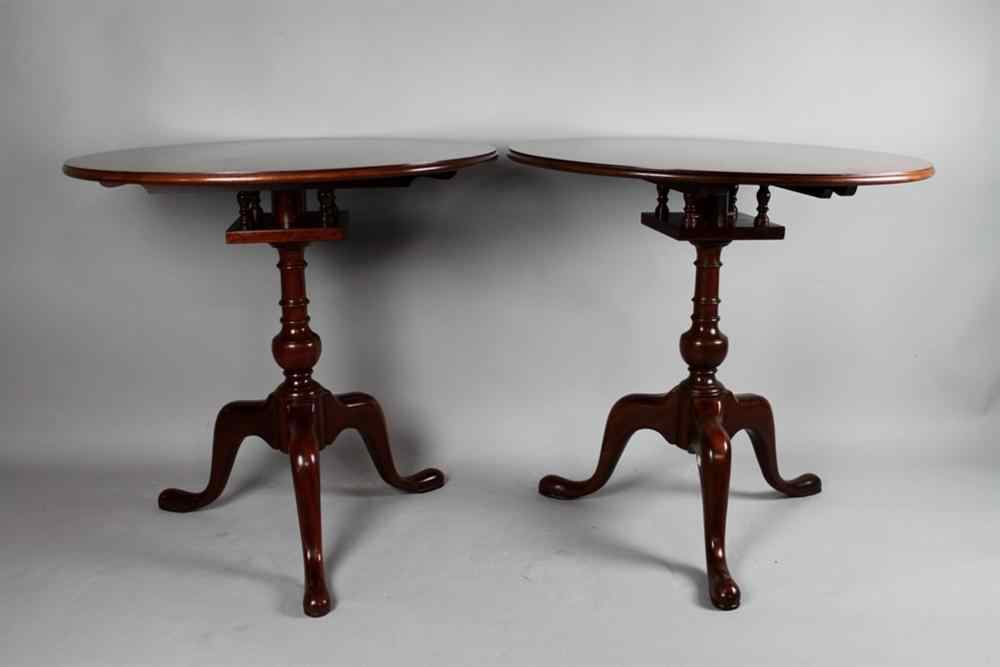 Appraisal: PAIR OF CHIPPENDALE STYLE MAHOGANY TILT TOP TEA TABLES Each