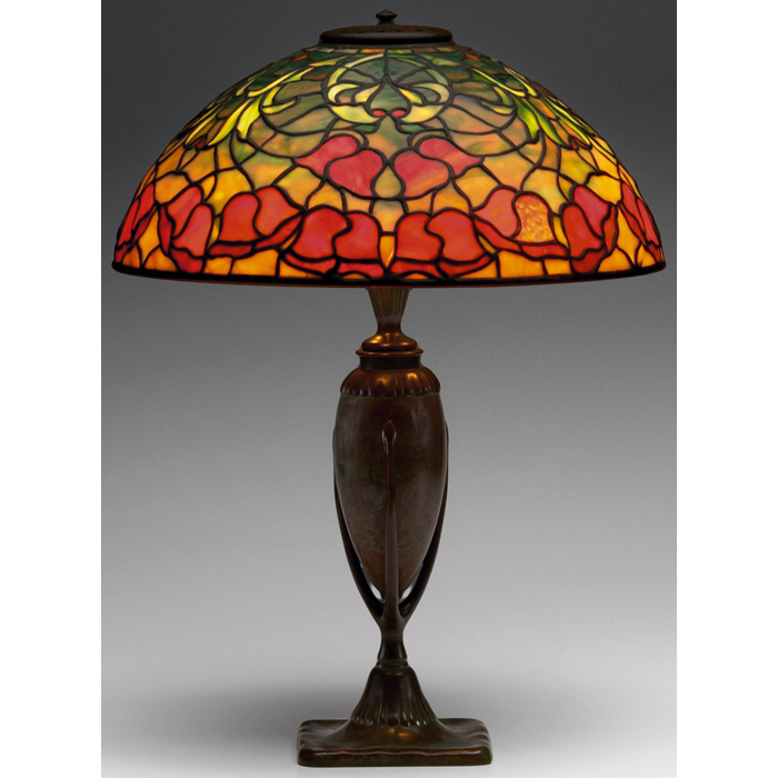 Appraisal: Tiffany Studios table lamp bronze base supporting a leaded glass